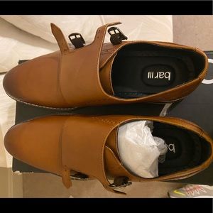 New. Never worn. Men’s size 12 dress shoe